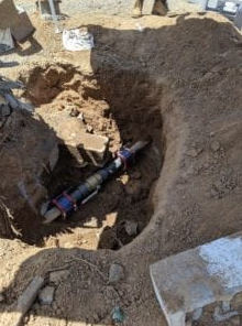 Leak on a sidewalk pipe